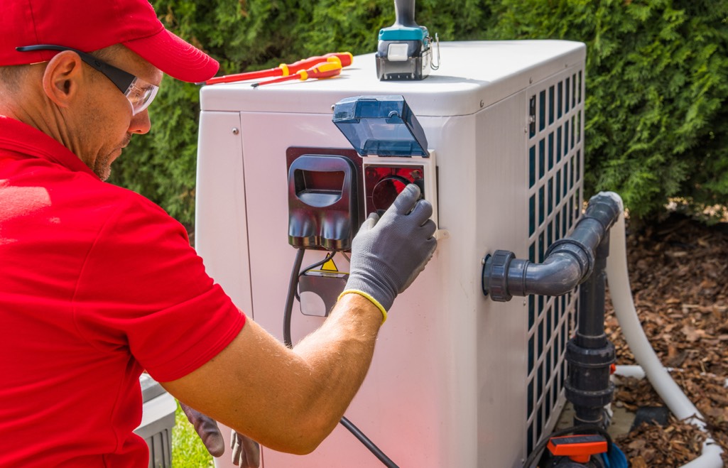 Heat pump installer in garden